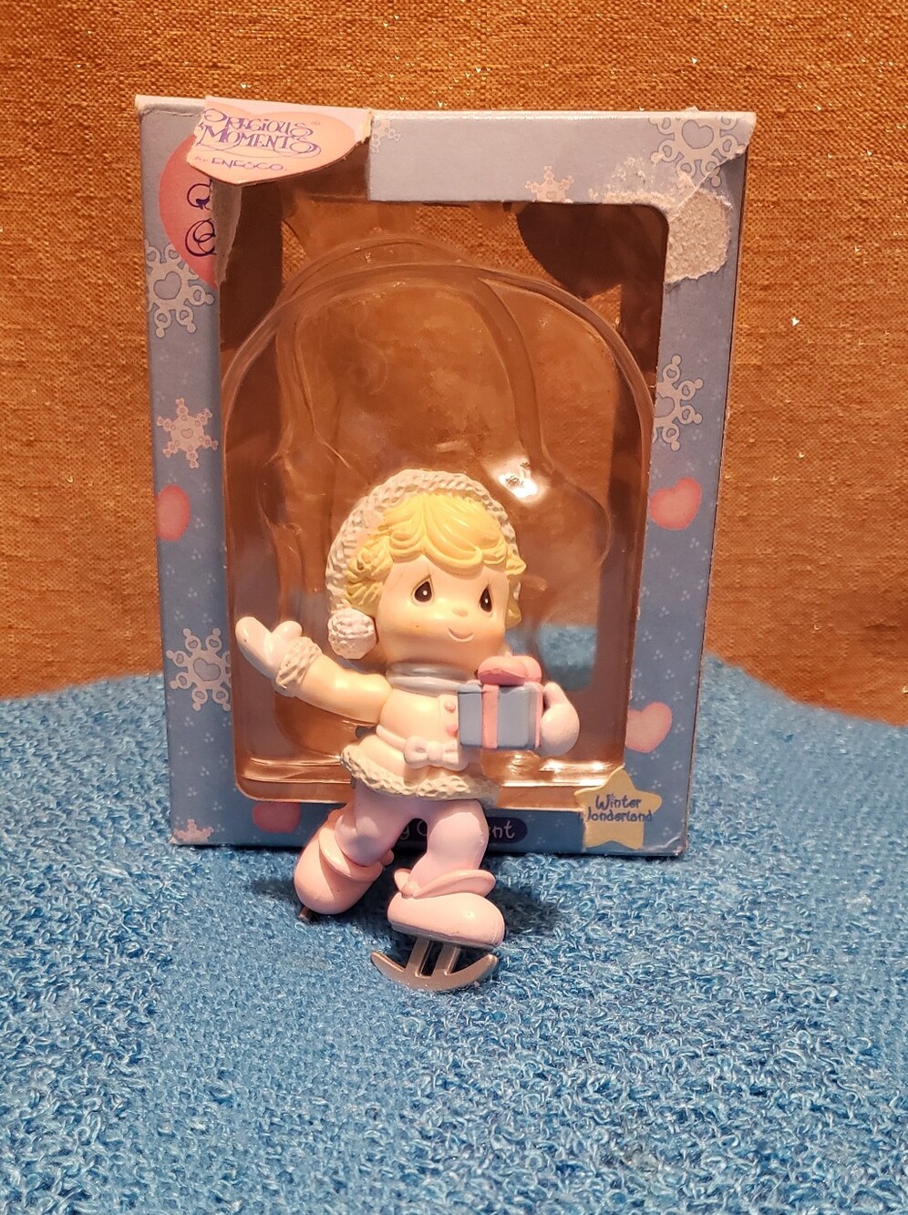Precious Moments Pink and White Ice Skater Ornament Holding Gift